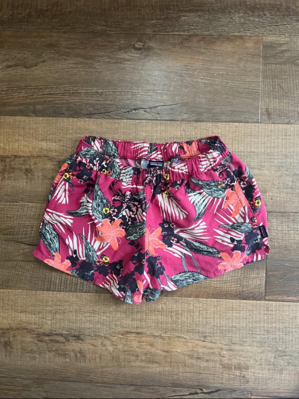 Patagonia Pink Floral Athletic Shorts with Orange Accents